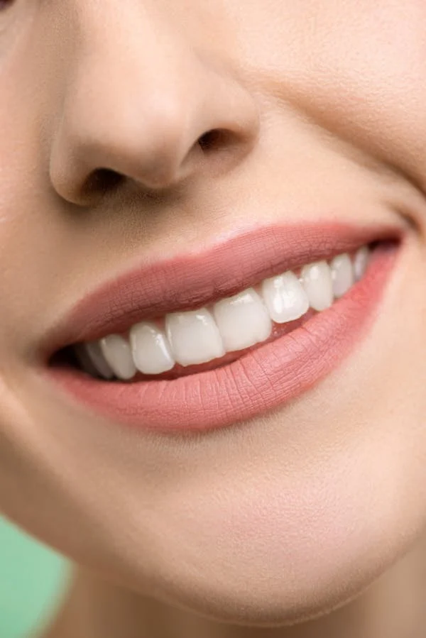 close-up shot of a woman's beautiful smile